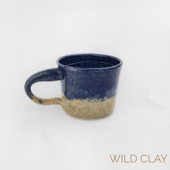 Twilight Mug $45.00 | 250ml | 1 Available Thrown stoneware mug with a rich blue twinkly glaze meeting a natural stoneware base.