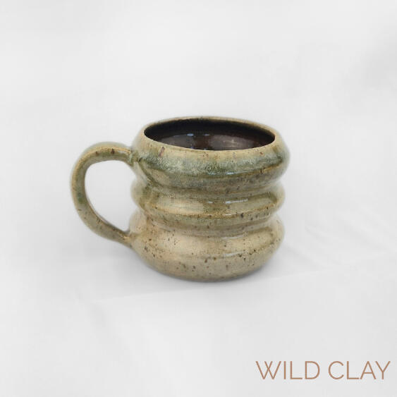 Riverside Mug $45.00 | 250ml | 1 Available Handcrafted mug with soft ridges and a mossy green glaze.