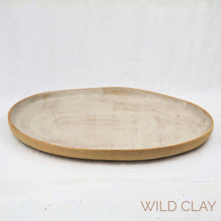 Sahara Speckle Platter $158.50 | 30cm W x 42cm L | 1 available Soft speckled tones and an organic shape for easy entertaining. In use image in gallery