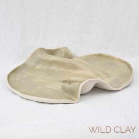 Sahara Charcuterie $160.00 | approx. 40 cm | from Preorder A wave platter in a soft speckled glaze, embracing the sculptural feel. In use image in gallery
