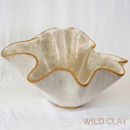 Wild Bloom Bowl | Earthline $170.00 | 1 Available Handcrafted with a soft white glaze and natural raw speckled clay edge. Roughly 17cm h by 32 cm w