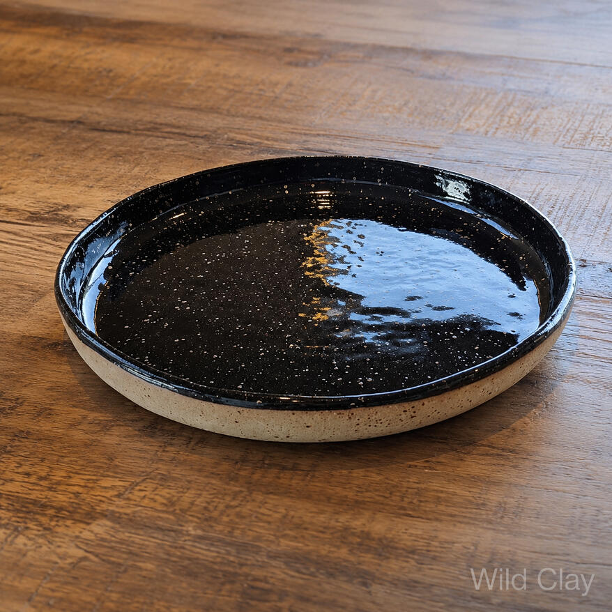 Serving Platter - Tuxedo Black Large $128 | 34 cm | Preorder Small $66.00 | 26 cm | Preorder A hand-built platter for salads or warm dishes when hosting.